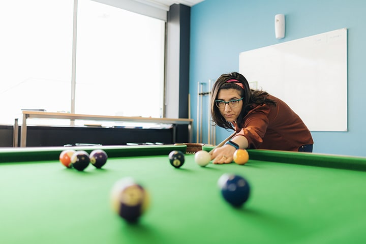 Person playing pool